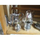 A silver plate tea pot, coffee pot and 2 cream jugs.