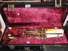 A vintage Boosey & Hawkes 400 trumpet in original case.