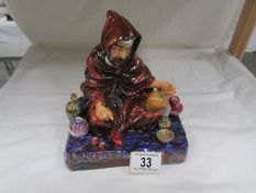 A Royal Doulton figurine, The Potter.