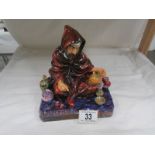 A Royal Doulton figurine, The Potter.