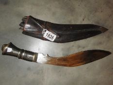 A Kukri with skinning knives.