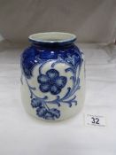 A Moorcroft style blue and white vase.