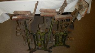 A quantity of cast metal seat framed including reversible railway seat and cinema seat frames.
