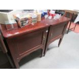 A pair of mahogany bedside cabinets,