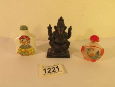 An Indian Diety figure and 2 Chinese scent bottles.