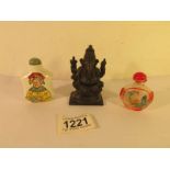 An Indian Diety figure and 2 Chinese scent bottles.