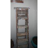 A wooden step ladder,.