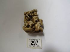 A netsuke of a group of monkeys.