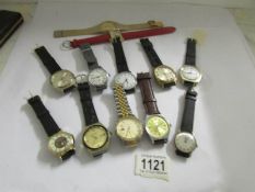 12 gentleman's mechanical wrist watches, all in working order.