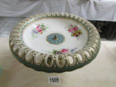 A 19th century continental porcelain comport on gilt metal base.