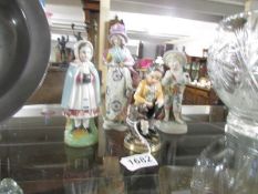 4 Victorian porcelain figures.