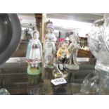 4 Victorian porcelain figures.