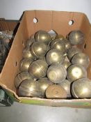 A box of spun brass balls.