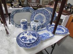 A mixed lot of blue and white table ware.