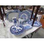 A mixed lot of blue and white table ware.