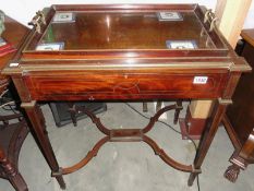 A mahogany tray top table with removable tray.