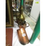 An old copper watering can, A Victorian copper corn scoop and a tall brass jug.