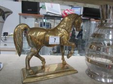 A solid brass horse.