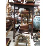 A mahogany occasional table.