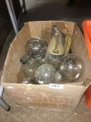 A box of large vintage light bulbs.