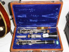 A Lark clarinet in case.