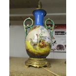 A good hand painted porcelain and ormolu table lamp base (need wiring).