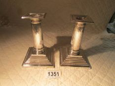 A pair of silver 'Palladian' style candlesticks, London 1893/94, 360 grams.