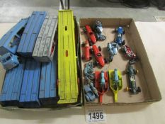 2 trays of Lesney dies cast toys including motor cycles, car transporters etc.