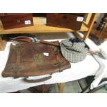 A vintage gamebird shooting stick, a tweed deer stalker hat and a leather briefcase.