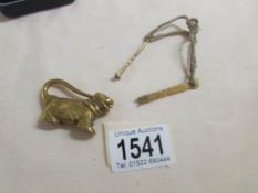 An old Chinese brass padlock with key in the form of a Dog of Fo.