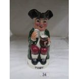 A Musical 'Charrington's' Toby jug.