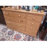 A pine 8 drawer chest.