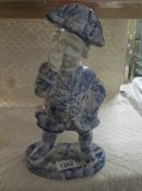 A large blue and white jar in the form of a figure wearing a tricorn hat, (a/f see images).
