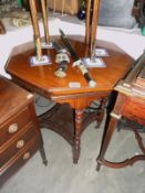 A mahogany octagonal occasional table.