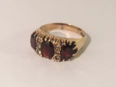 A ladies dress ring in 9ct gold, Hall marked Birmingham 1994. Size S.