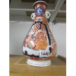 A signed Chinese vase (restored)