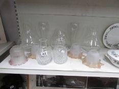 A mixed lot of glass ware including lamp shades.