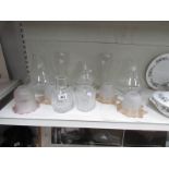 A mixed lot of glass ware including lamp shades.