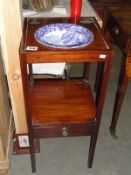 A Georgian mahogany wash stand with later blue and white basin.