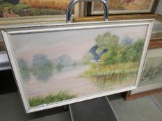 An oil on board rural scene with stork in flight signed B Cox, image 75 x 45 cm.