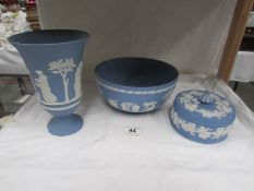 A Wedgwood Jasper ware lidded pot, vase and bowl.