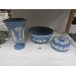 A Wedgwood Jasper ware lidded pot, vase and bowl.