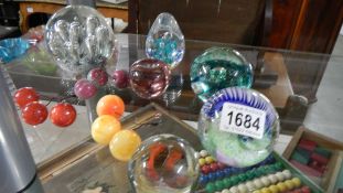 5 glass paperweights and glass cherries.