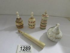 3 19th century ivory scent bottles, an ivory needlecase and one other item.