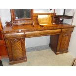 A Victorian mahogany double pedestal sideboard.