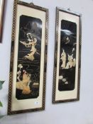 A pair of oriental lacquered wall plaques.