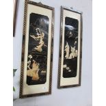 A pair of oriental lacquered wall plaques.