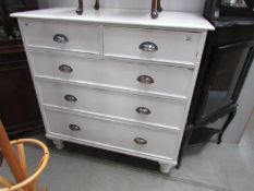 A 2 over 3 painted chest of drawers.