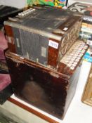 A German 'Vulkan' accordion in old wood box.