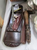 A bakelite pen tray and contents.